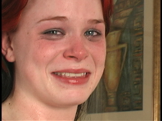 Adult film star Vicci Valencorte, after crying from a spanking during a scene from Far East Media.
