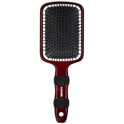 A Conair-brand wooden paddle-style hairbrush.
