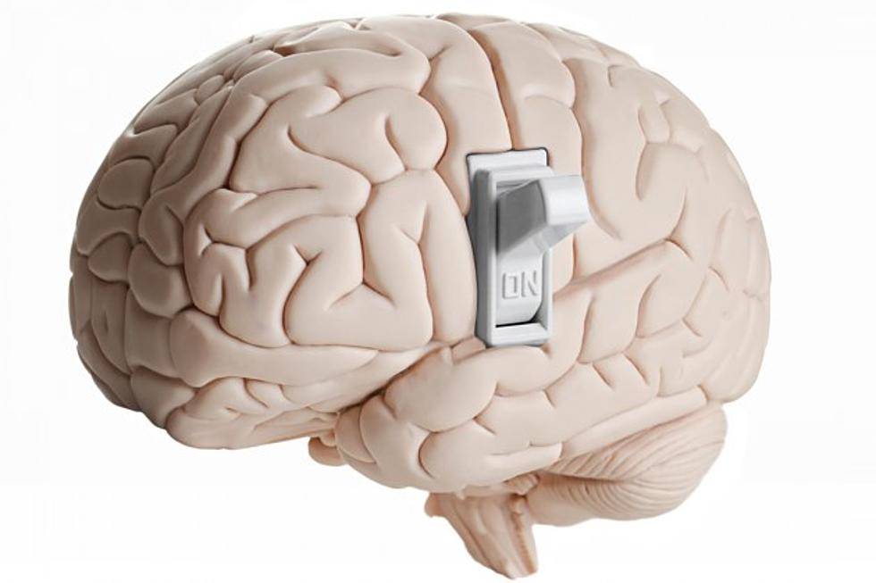 A brain with an on-off switch on the side, flipped to "on".
