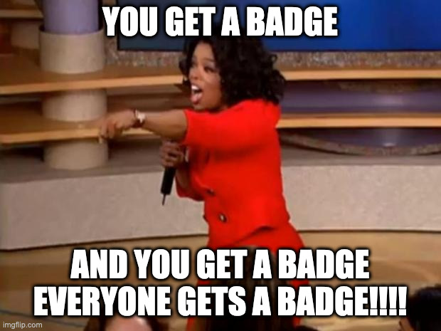 Oprah Winfrey in a red dress, captioned "You get a badge, and you get a badge; everyone gets a badge!"