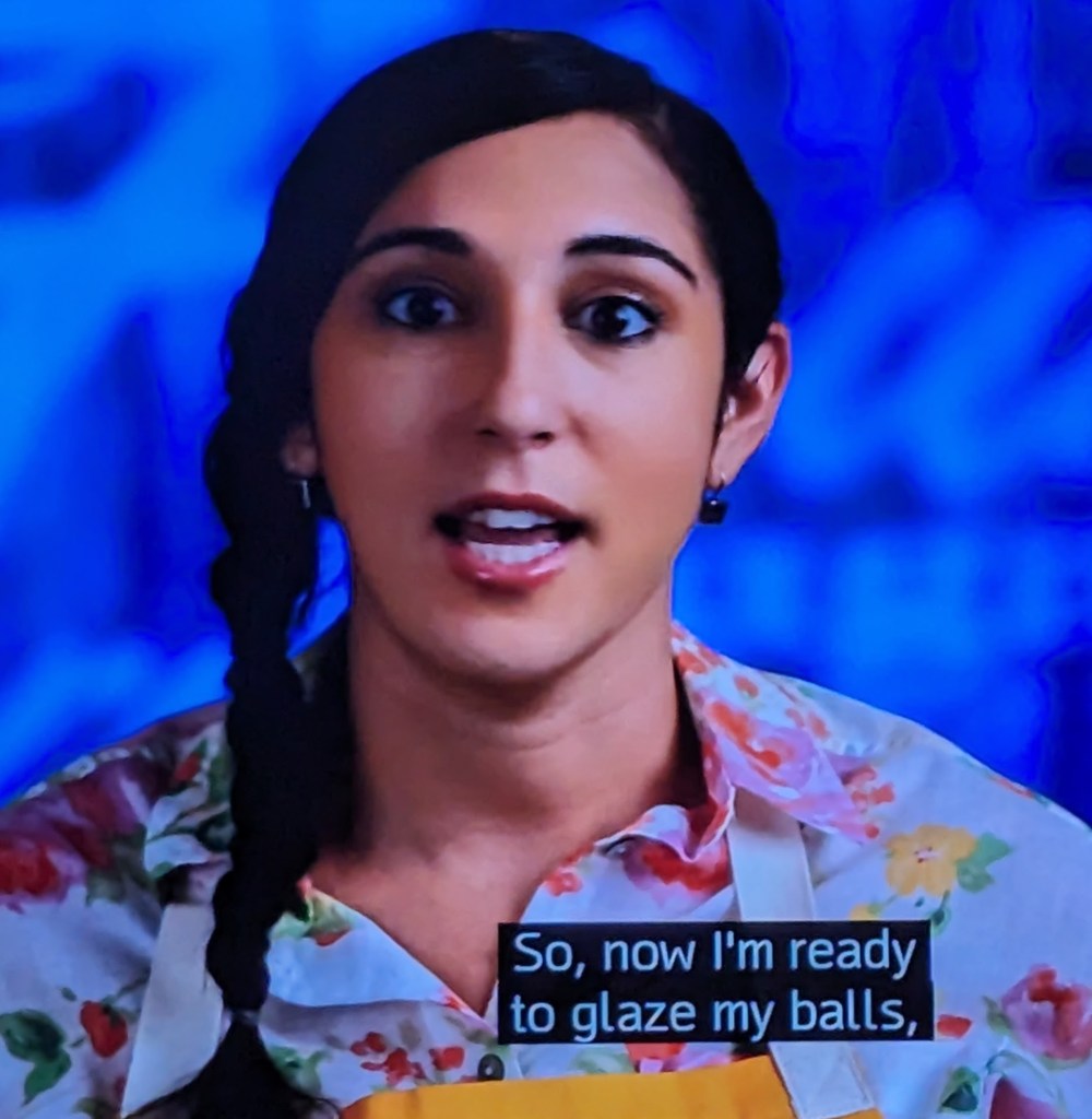 A contestant from a Food Network baking show, captioned: "So, now I'm ready to glaze my balls."