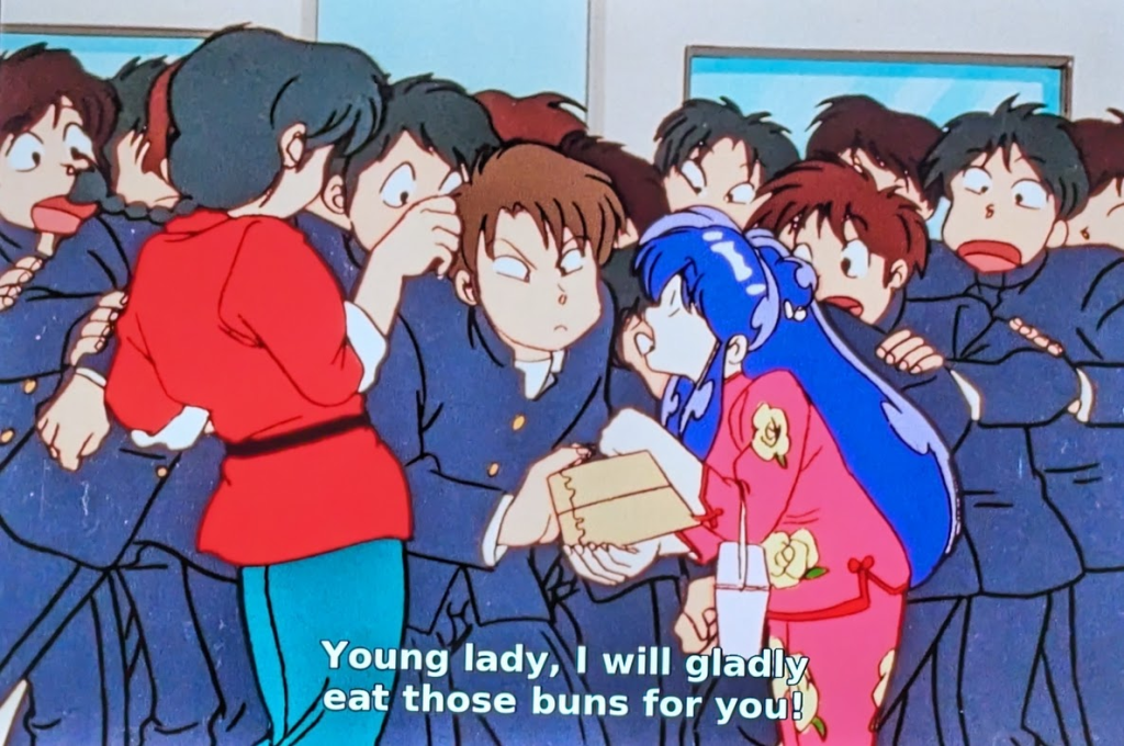 A scene from Ranma 1/2 where Shampoo is holding a box of buns and a fellow student says "Young lady, I will gladly eat those buns for you!"